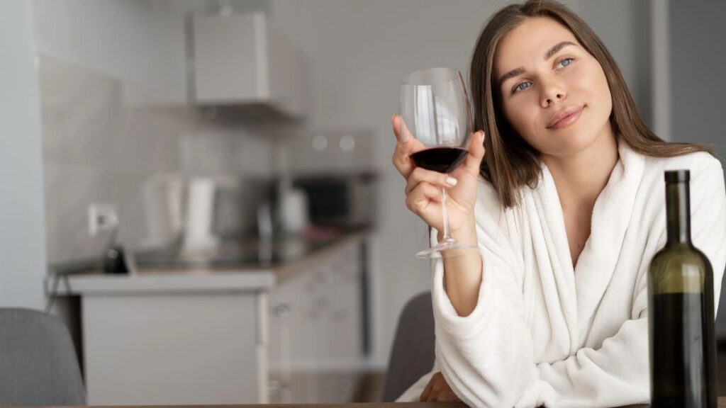 woman with glass of wine