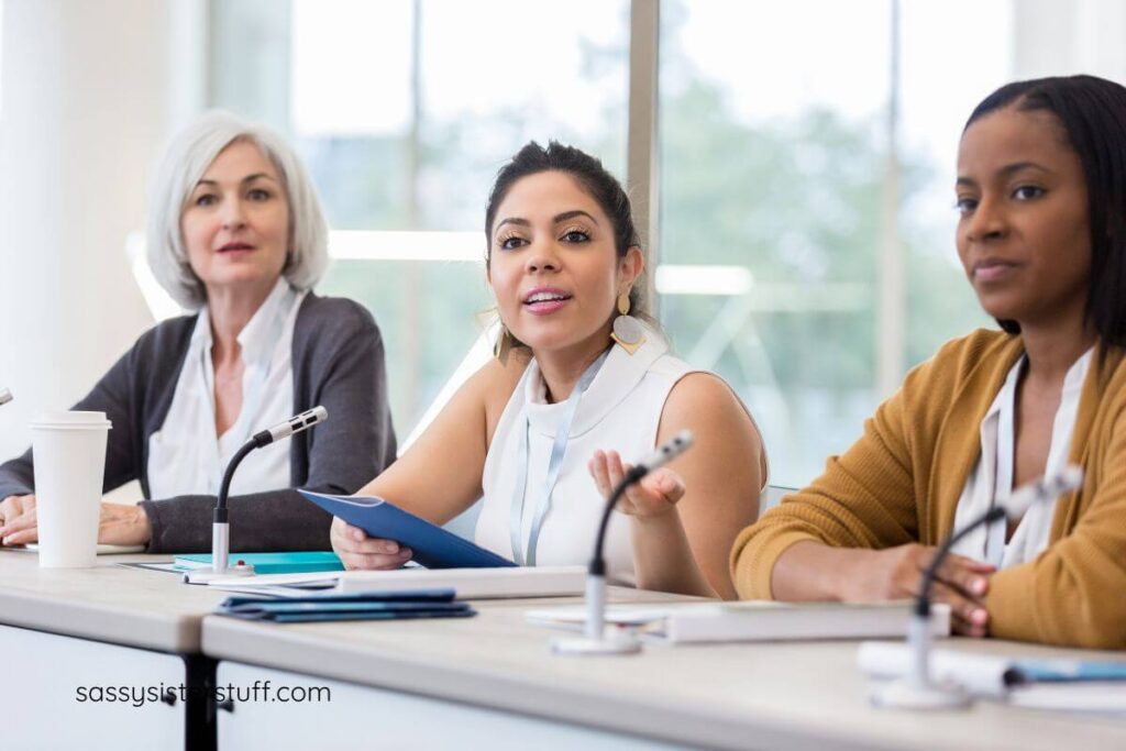 three ladies in leadership presenting at a work conference.