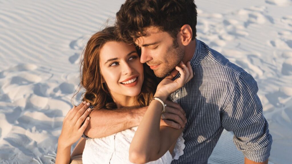 happy couple on the beach