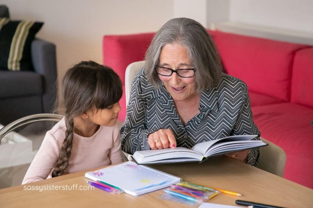 grandmother reads a book to her darling granddaughter.