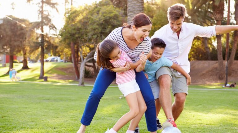 family playing soccer