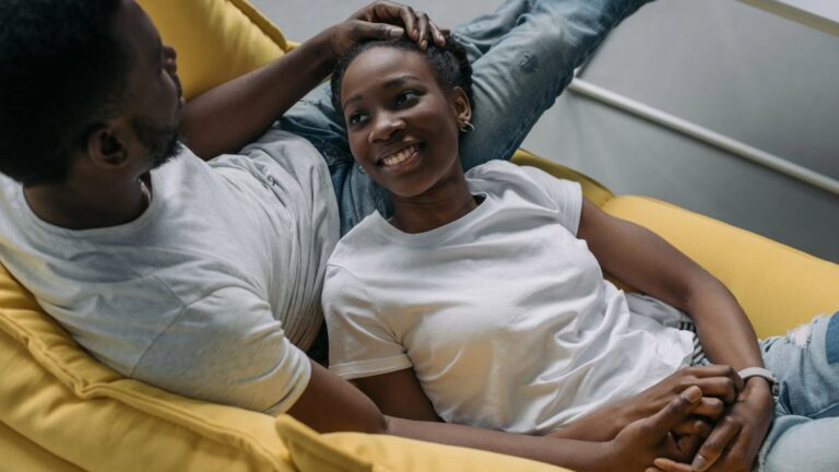 happy couple on couch