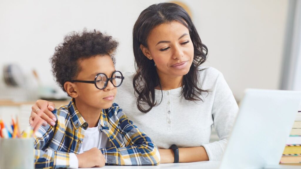 mom and son on computer