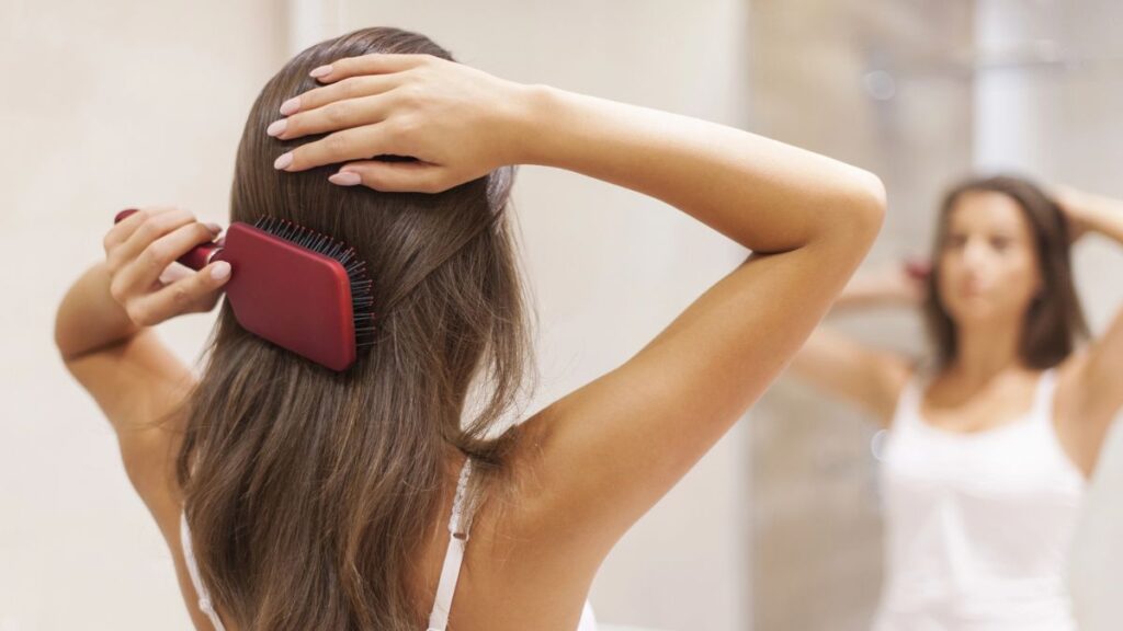 woman brushing hair