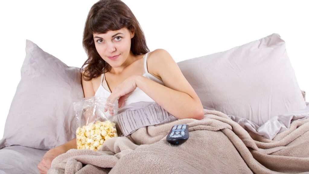 woman eating popcorn